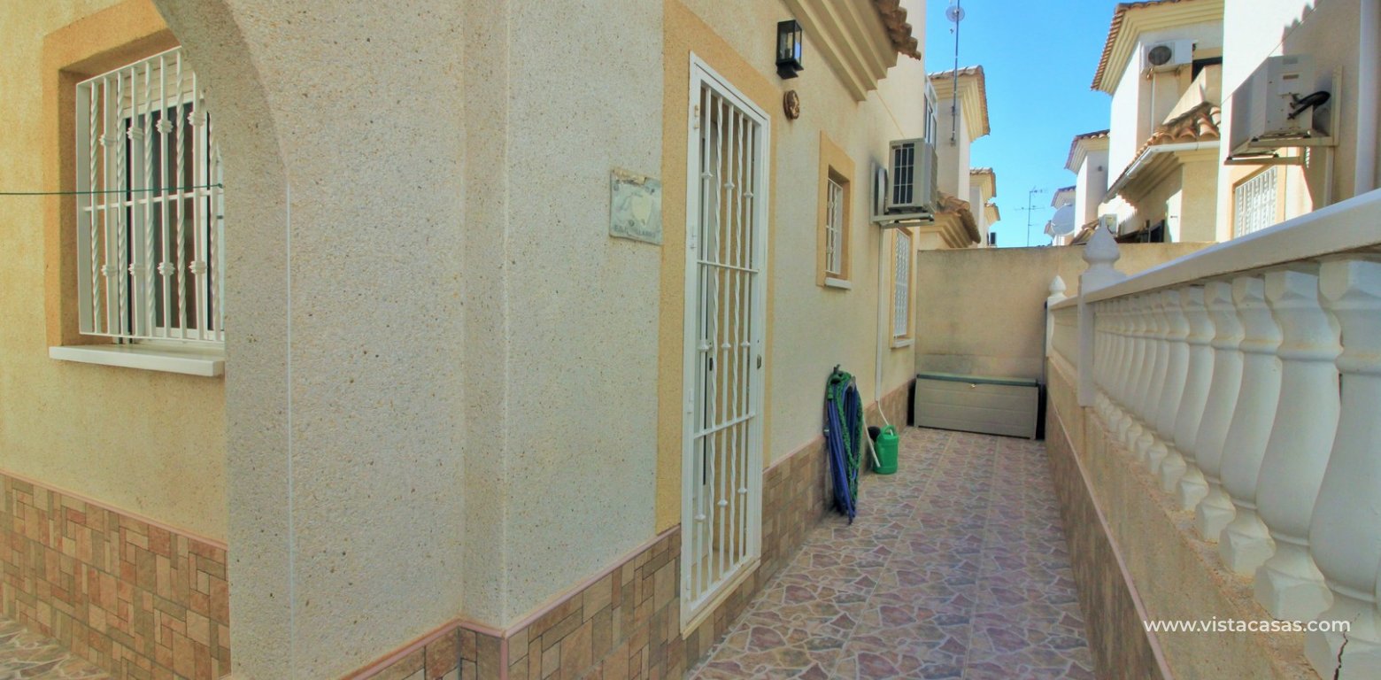 South facing detached villa for sale La Pinada Playa Flamenca rear terrace utility area