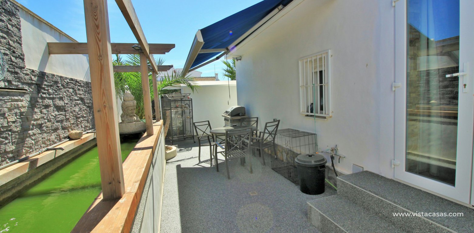 Property for sale in Quesada rear garden water feature
