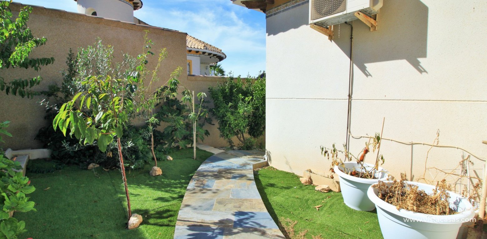 Detached villa for sale in Pinada Golf Villamartin rear garden