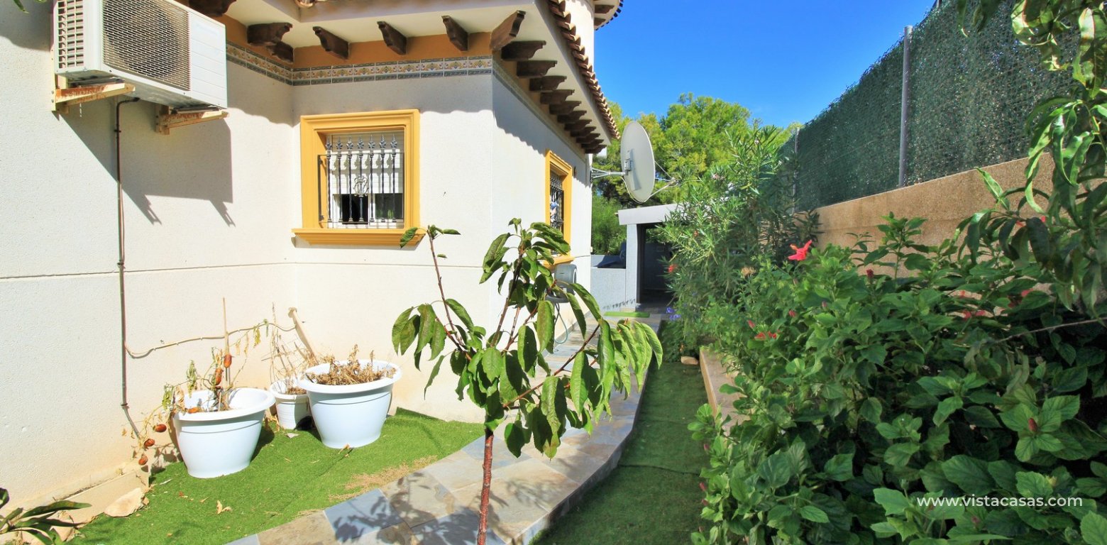 Detached villa for sale in Pinada Golf Villamartin back garden