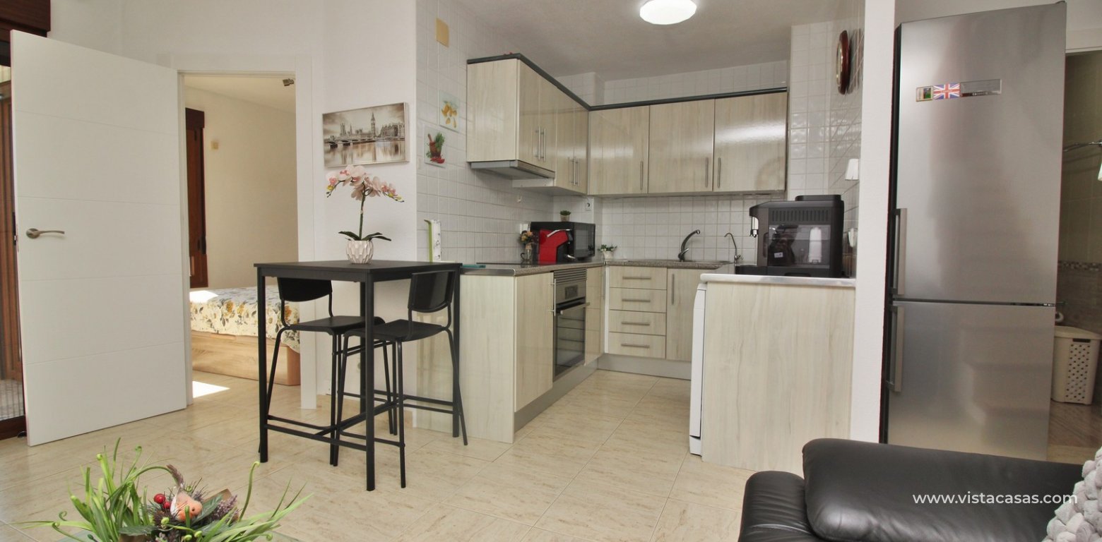 South facing duplex apartment for sale Villamartin Golf lounge open kitchen