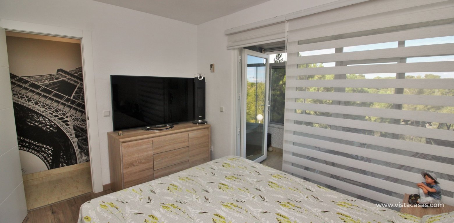 South facing duplex apartment for sale Villamartin Golf master bedroom balcony