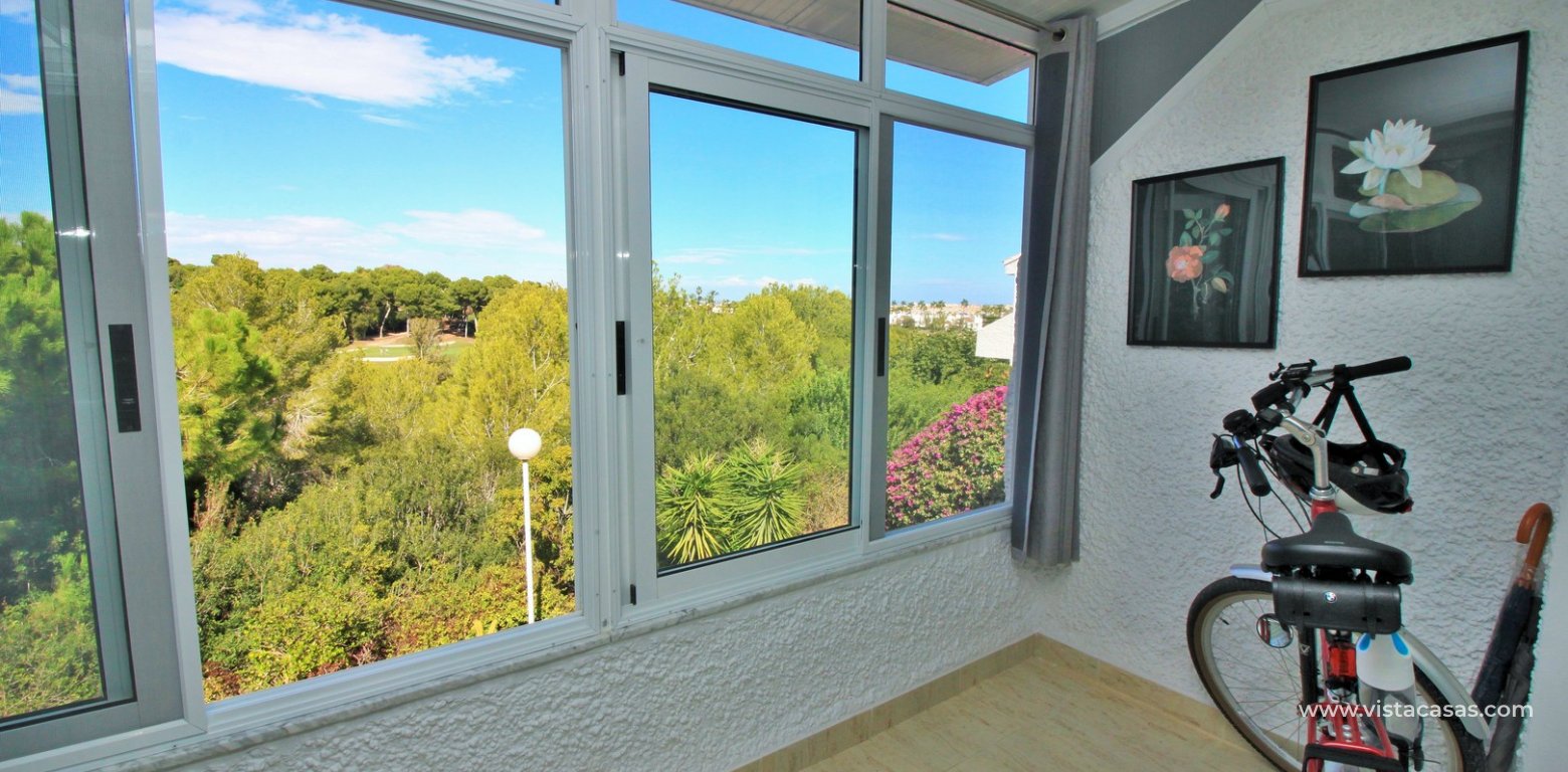 South facing duplex apartment for sale Villamartin Golf enclosed balcony golf view