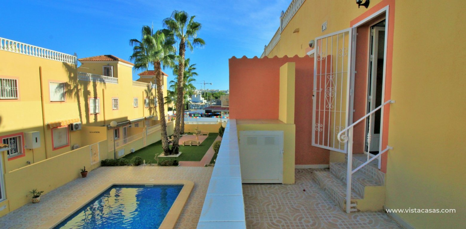 3 bedroom townhouse for sale Colinas Puerta Real 5 Villamartin rear balcony pool view