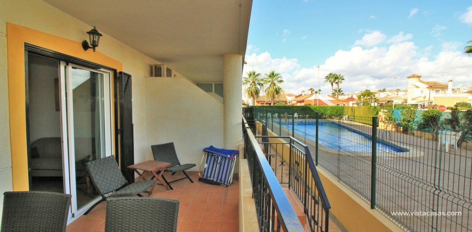 Ground floor apartment for sale La Mirada Playa Flamenca terrace pool view