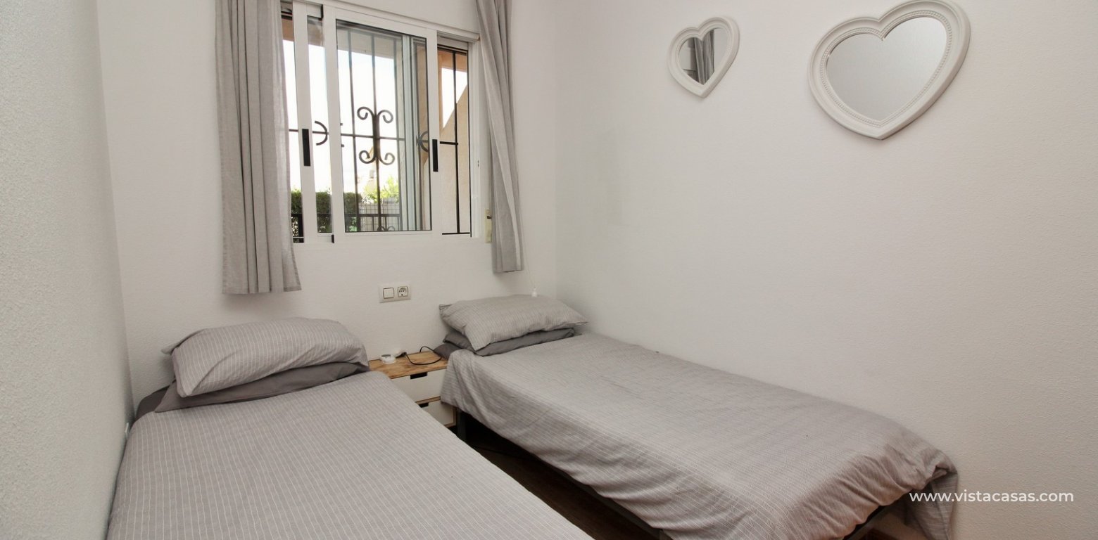 Ground floor apartment for sale La Mirada Playa Flamenca twin bedroom