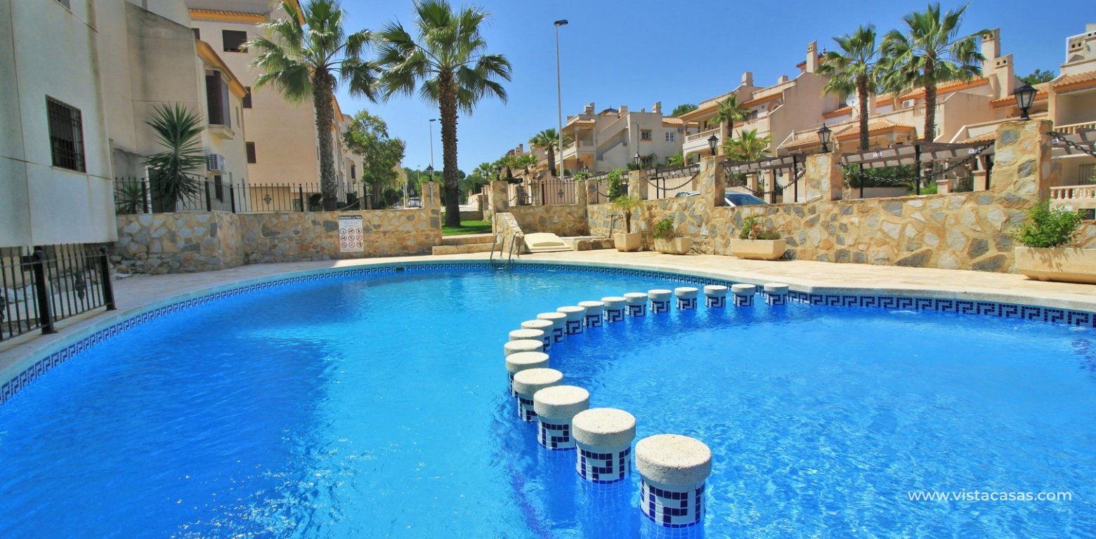 Top floor apartment for sale in Las Ramblas Golf communal pool