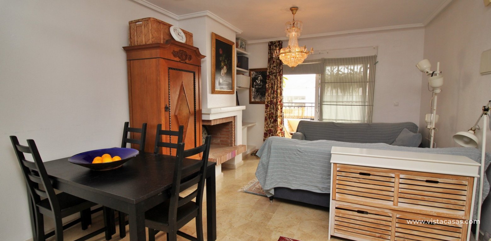 Top floor apartment for sale Montilla IV Playa Flamenca lounge diner
