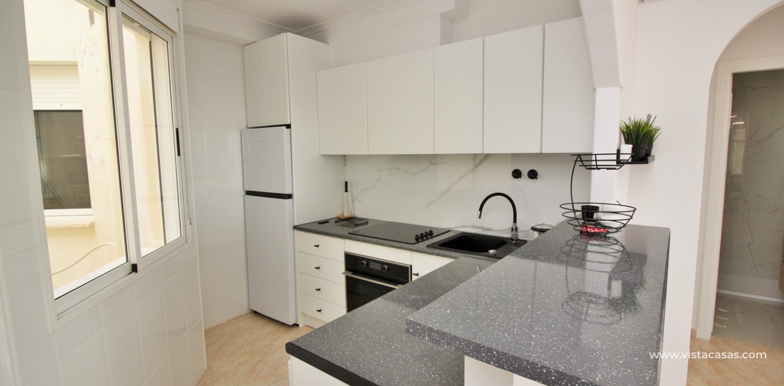 Top floor apartment for sale Sol de Mar Playa Flamenca kitchen