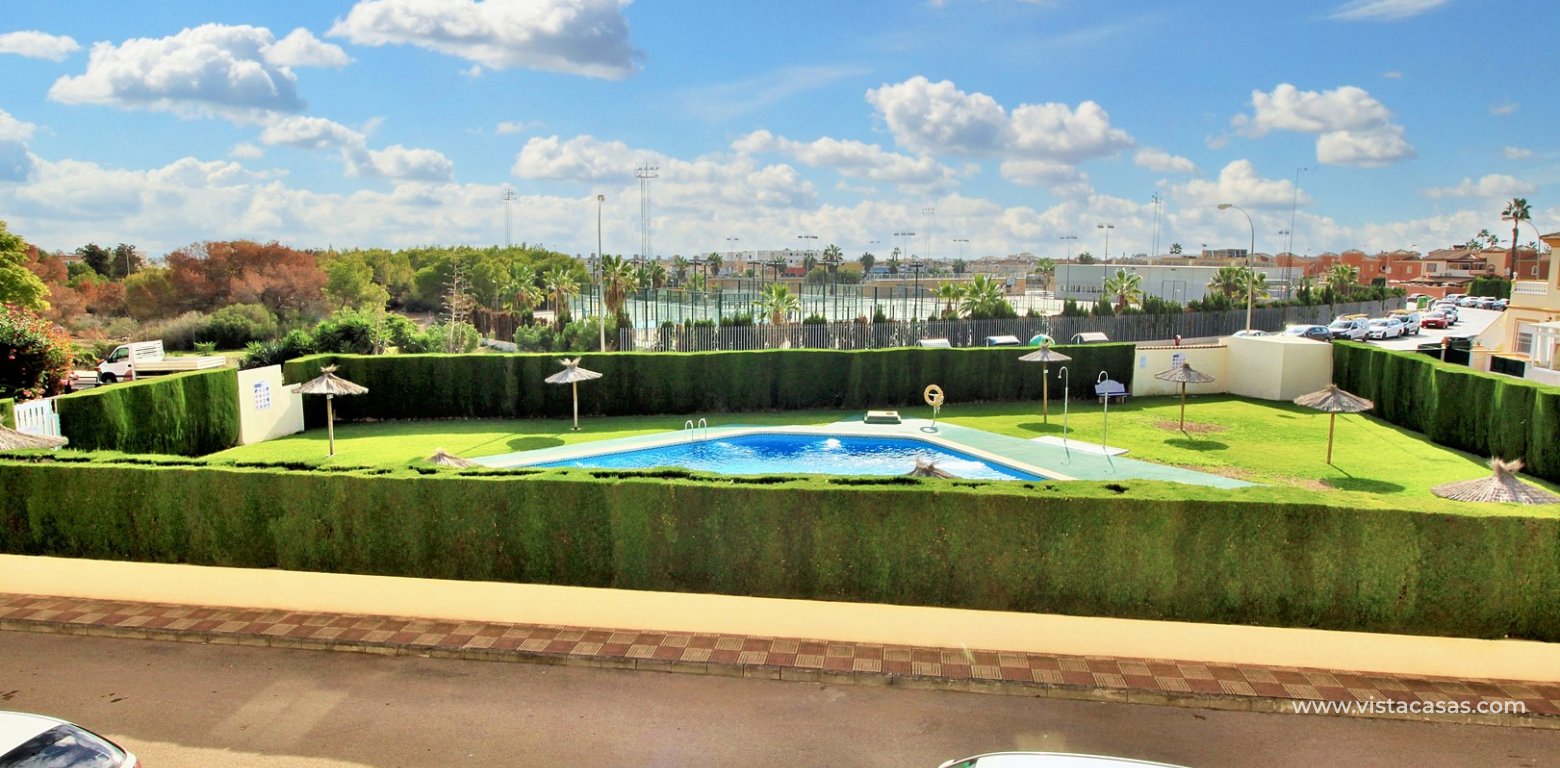 Top floor apartment for sale Sol de Mar Playa Flamenca overlooking pool