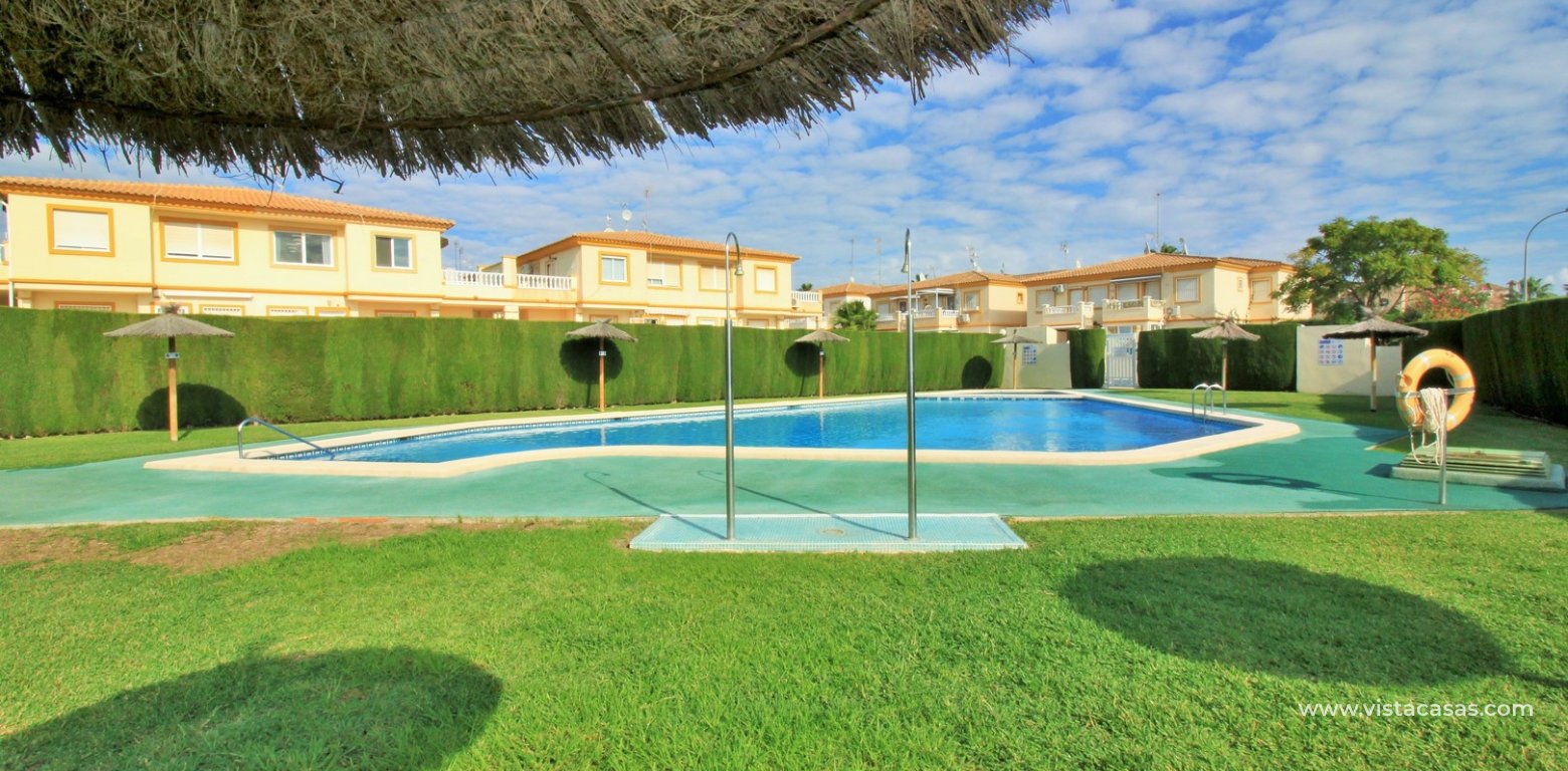 Top floor apartment for sale Sol de Mar Playa Flamenca communal gardens