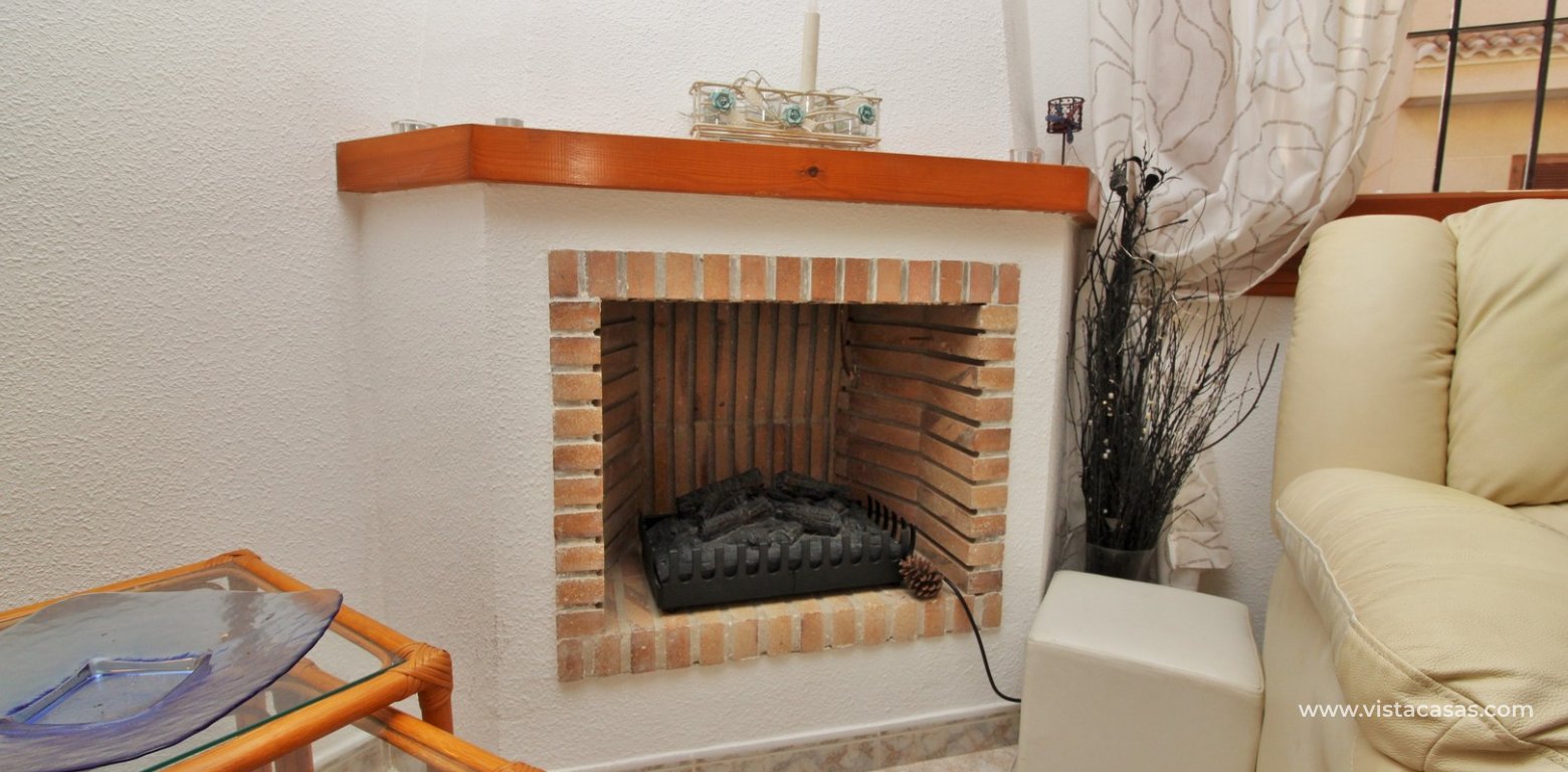 South facing townhouse for sale Playa Flamenca Vistacasas fireplace