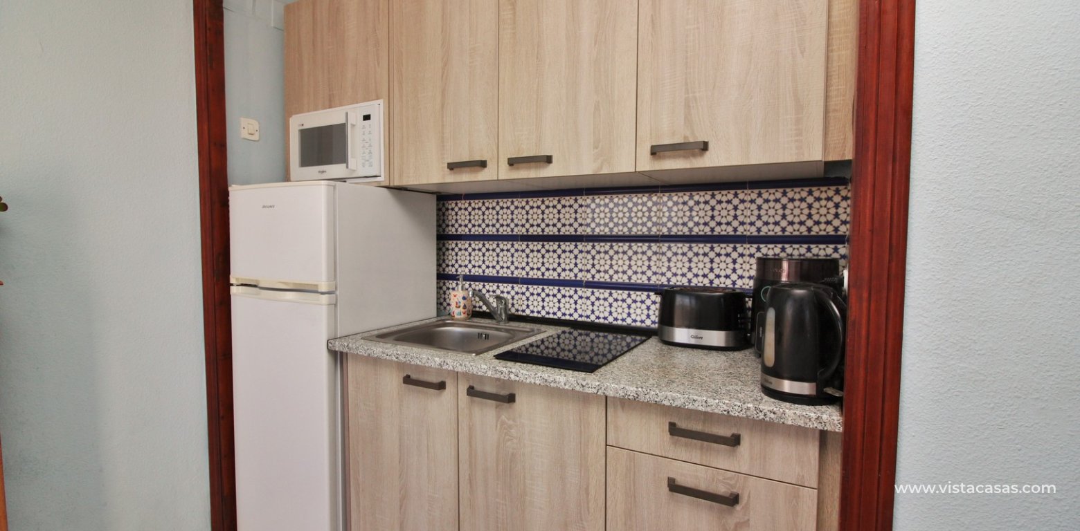 Top floor apartment for sale in El Mirador Villamartin renovated kitchen