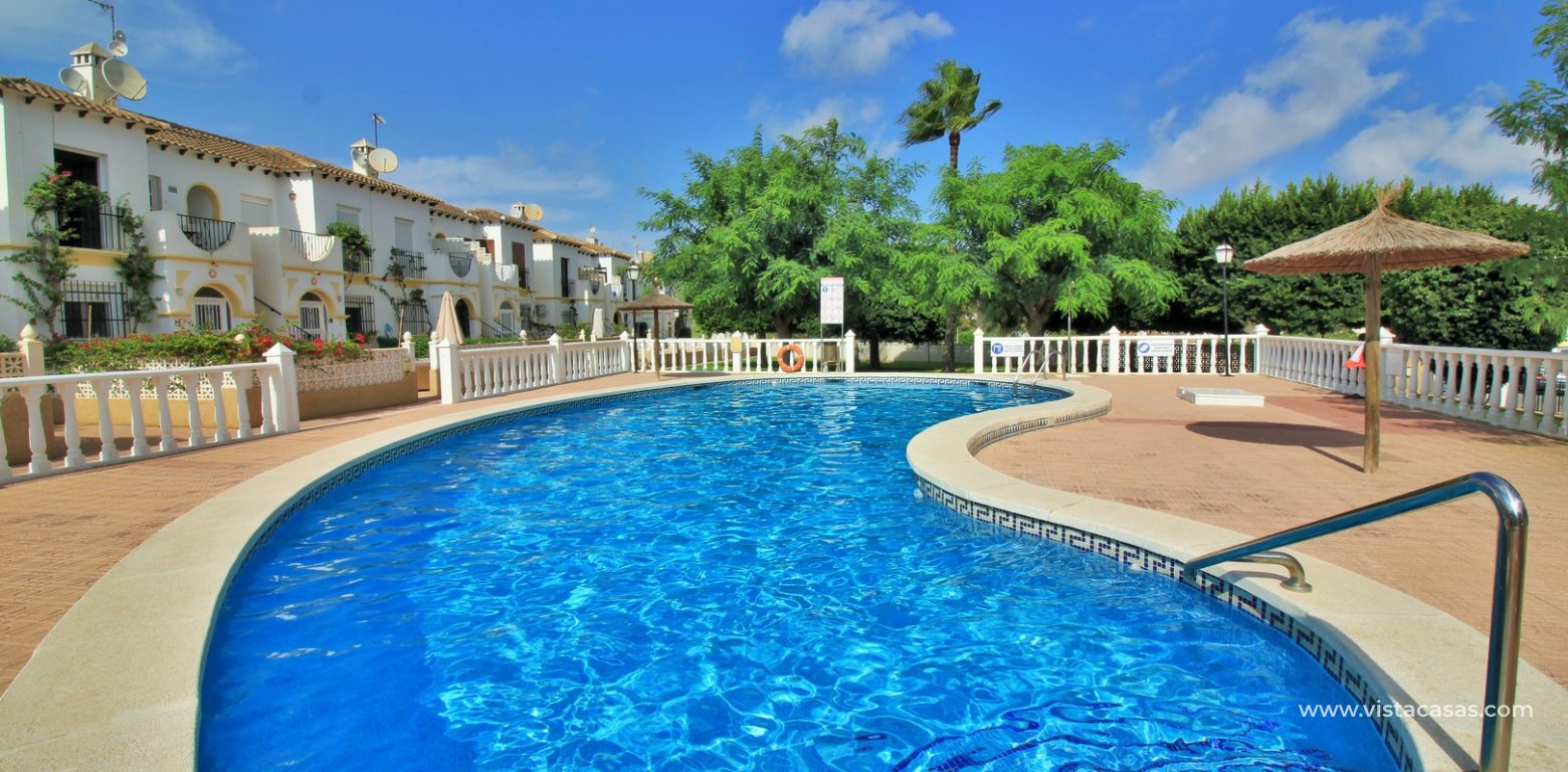 Top floor apartment for sale in El Mirador Villamartin swimming pool