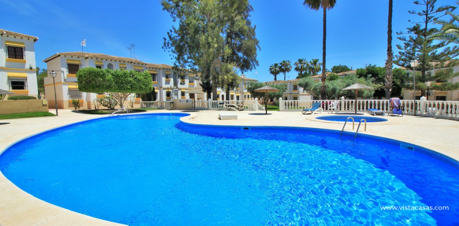 Top floor apartment for sale in El Mirador Villamartin communal swimming pool