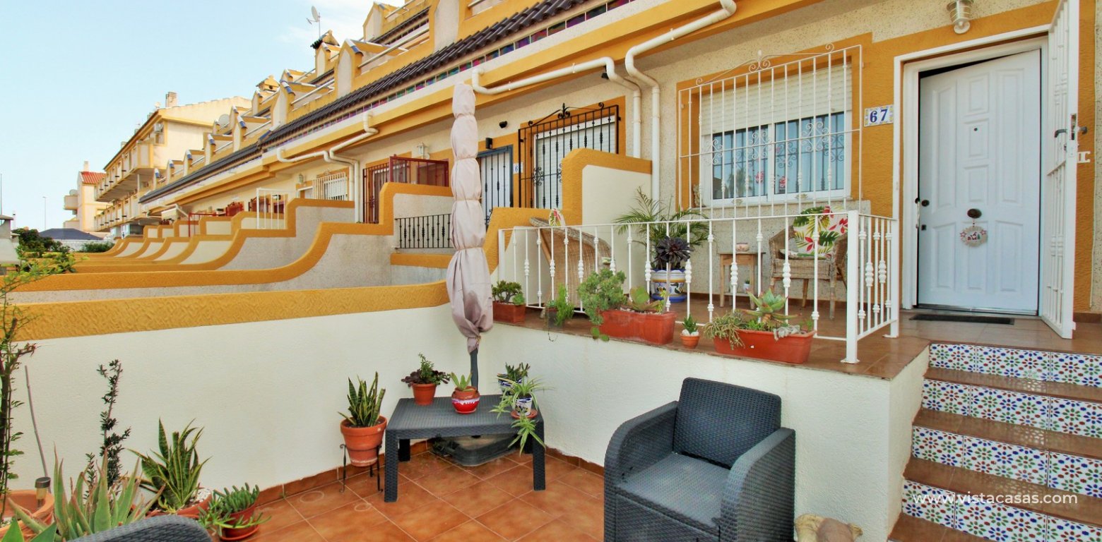 Townhouse for sale in Amapolas VII Playa Flamenca garden