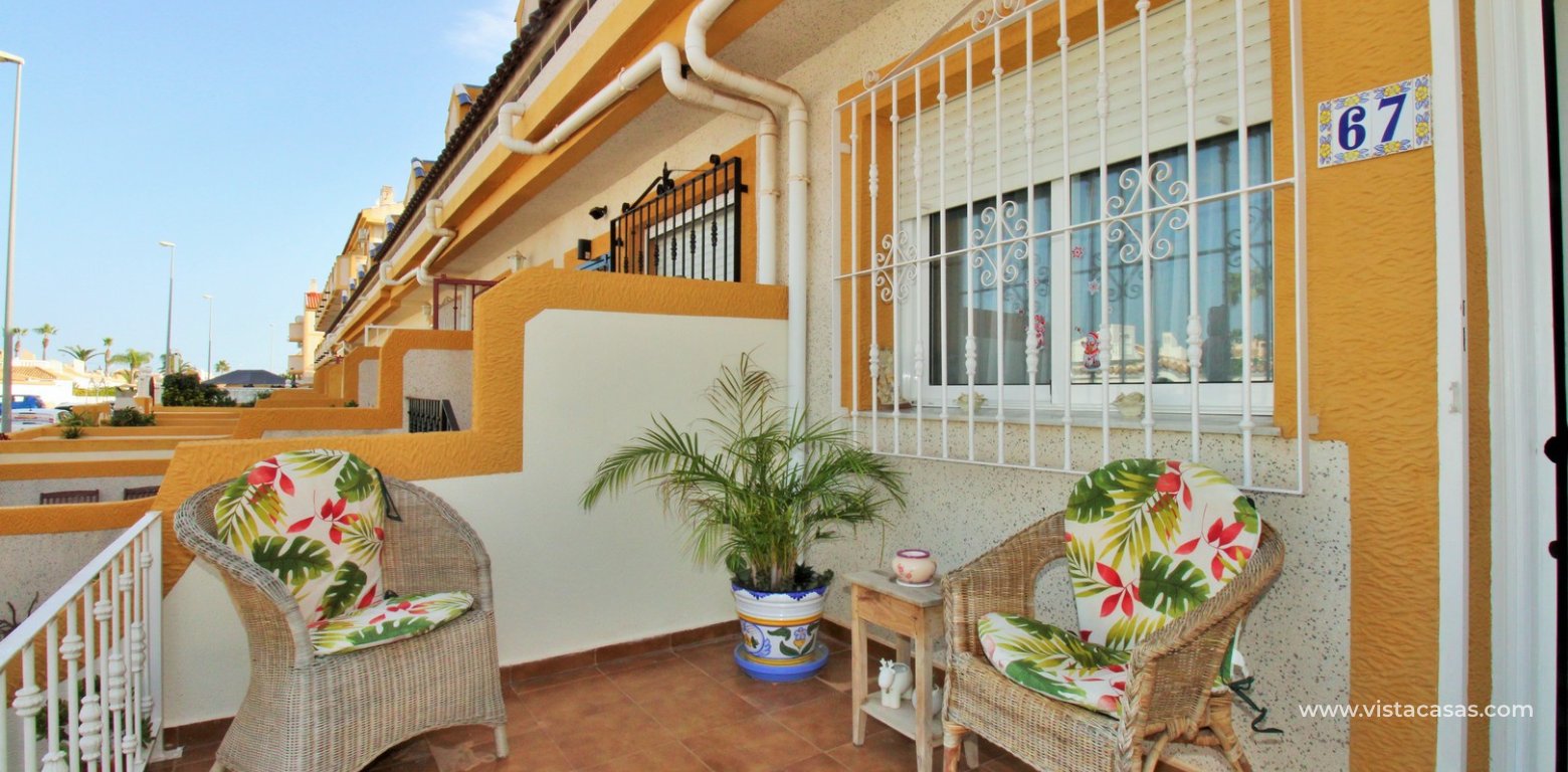 Townhouse for sale in Amapolas VII Playa Flamenca terrace front