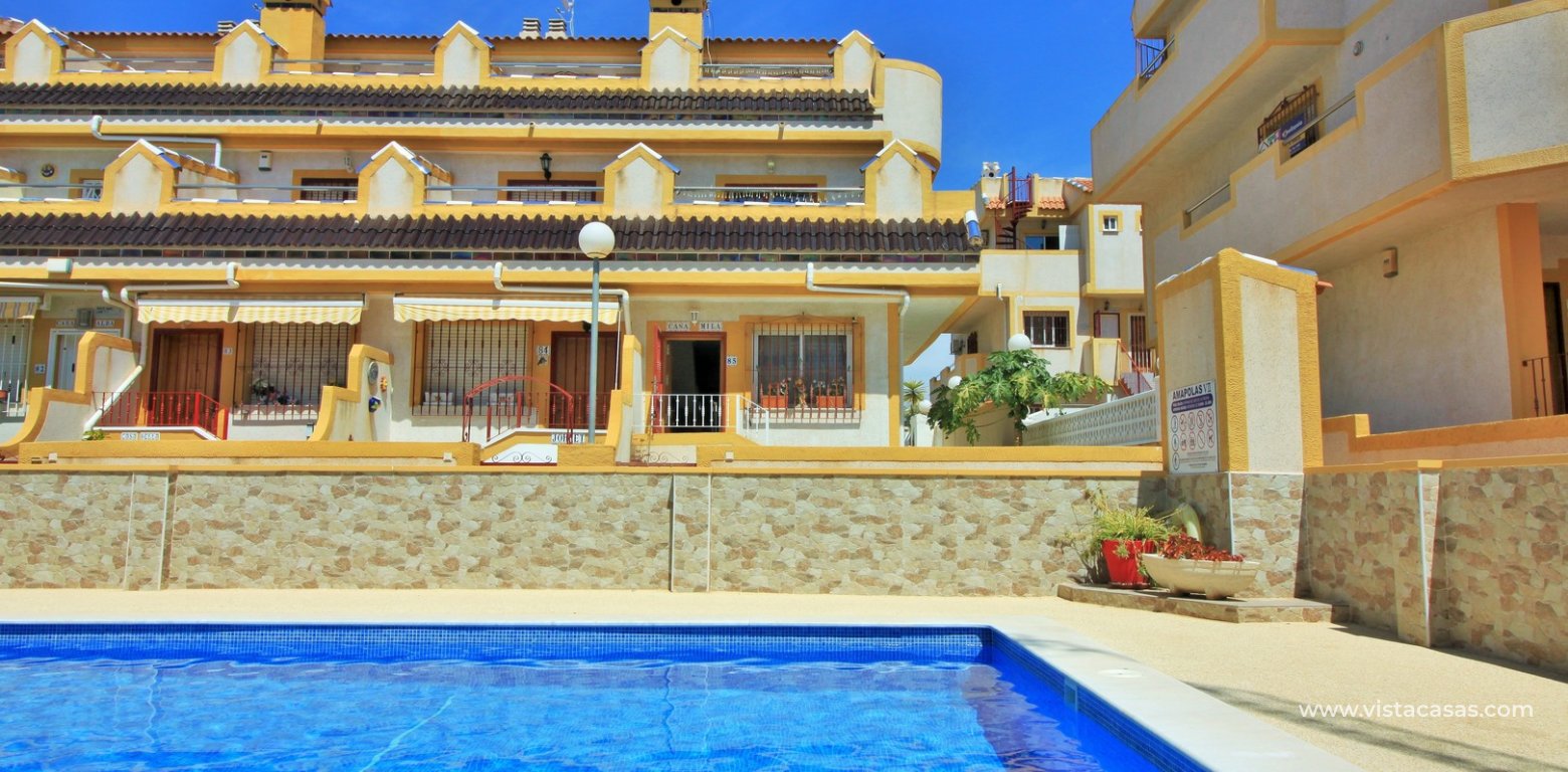 Townhouse for sale in Amapolas VII Playa Flamenca swimming pool