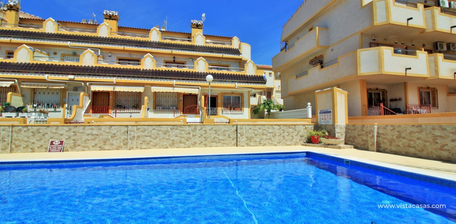 Townhouse for sale in Amapolas VII Playa Flamenca pool 2