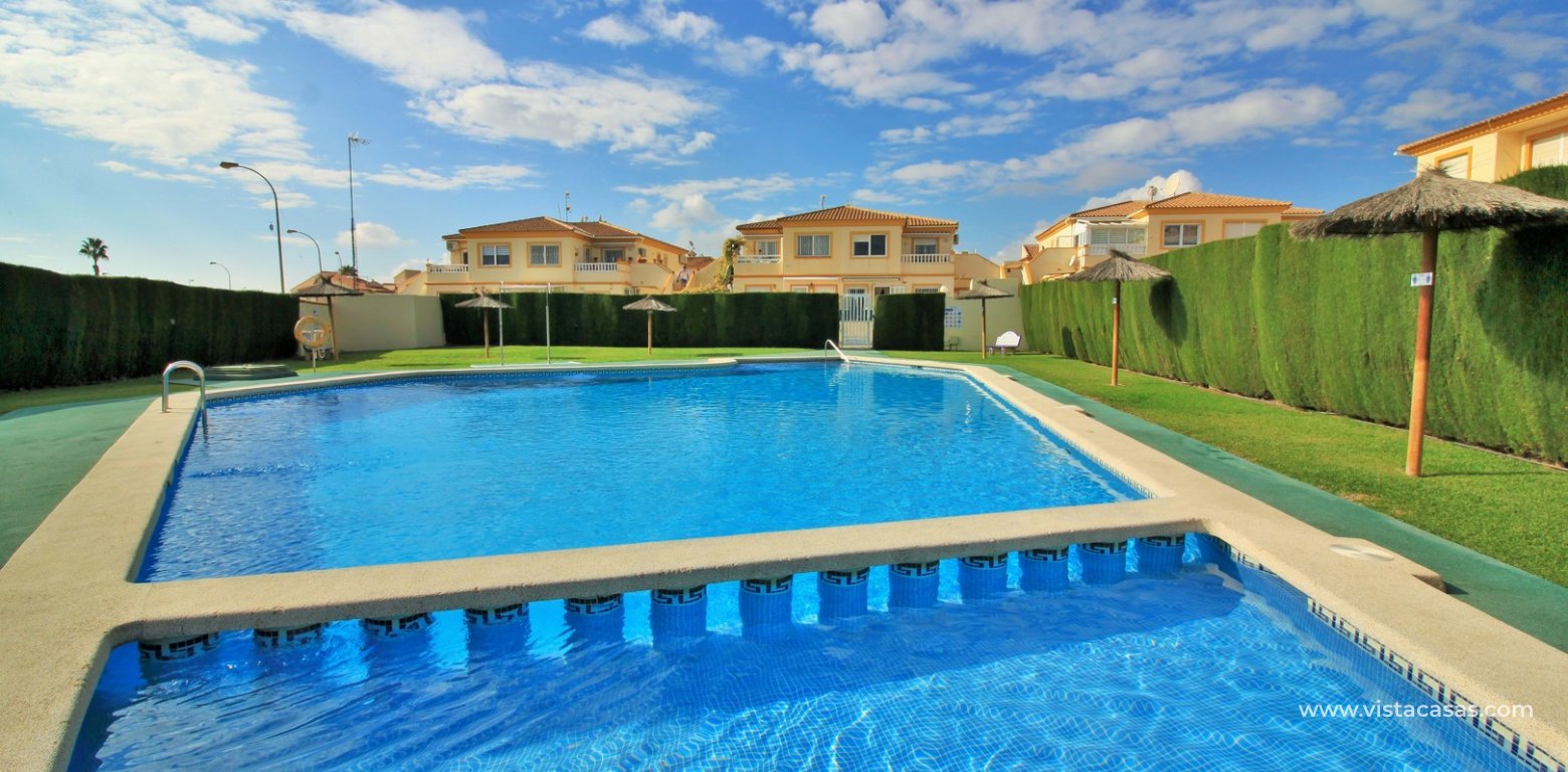 Top floor apartment for sale Sol de Mar Playa Flamenca communal pool