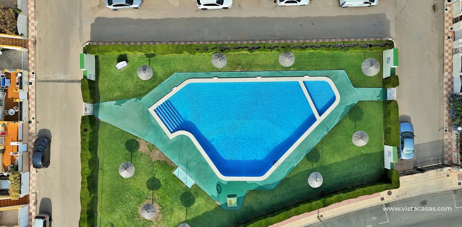 Top floor apartment for sale Sol de Mar Playa Flamenca pool area 2