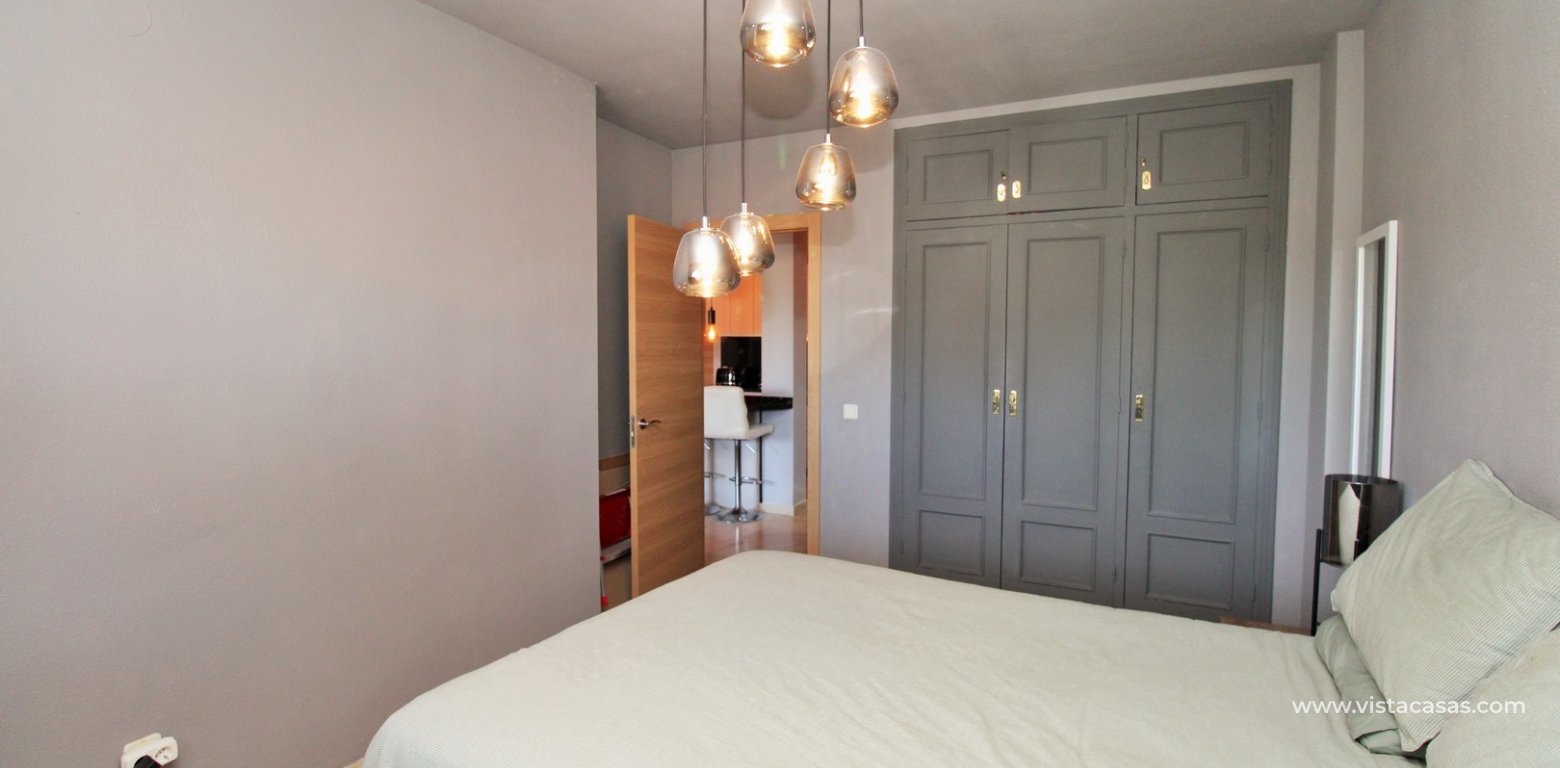 Renovated apartment in the Villamartin Plaza Villagolf master bedroom fitted wardrobes
