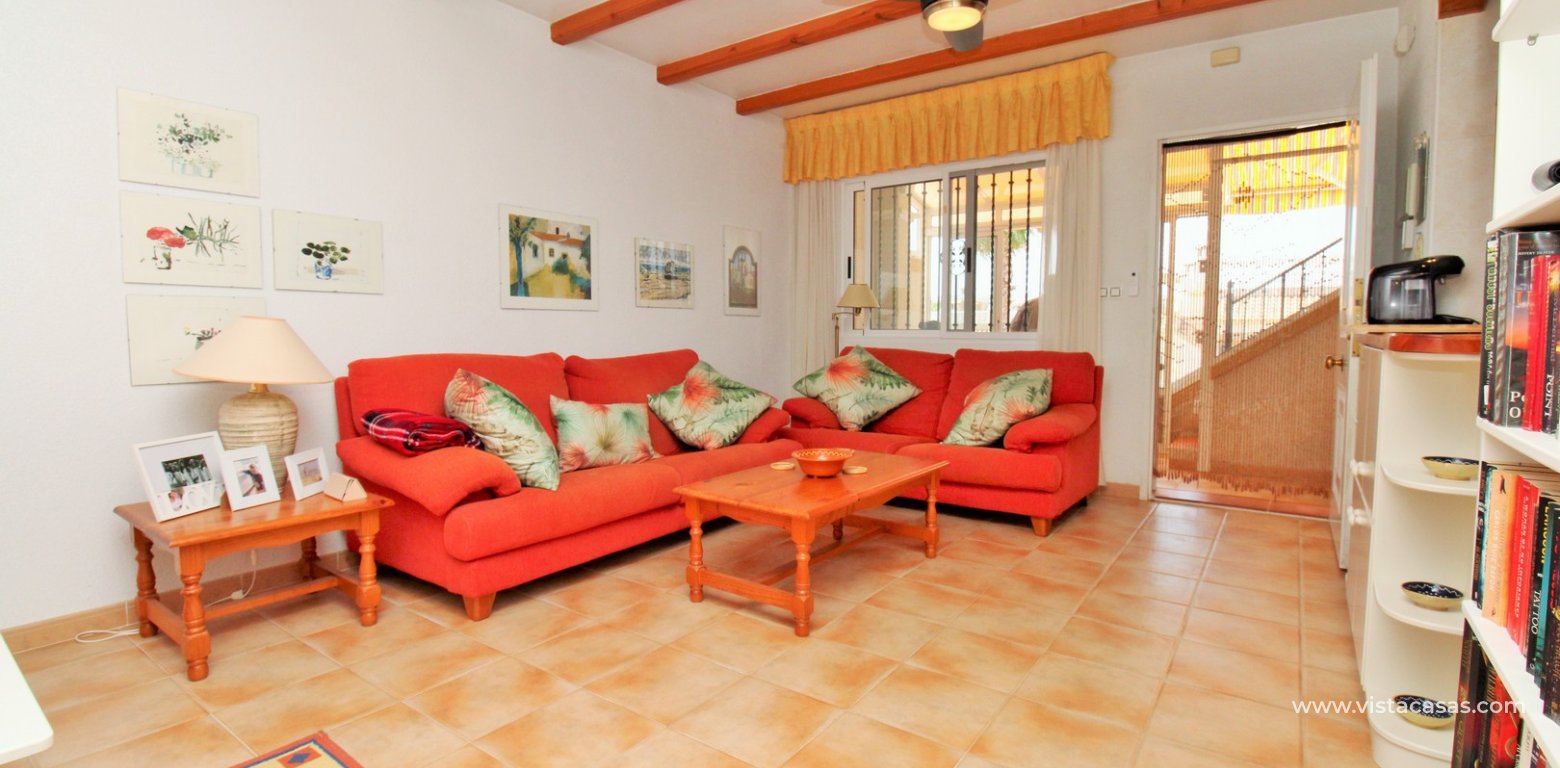 Villamartin 2 bed bungalow monte golf roof terrace pool for sale lounge 3