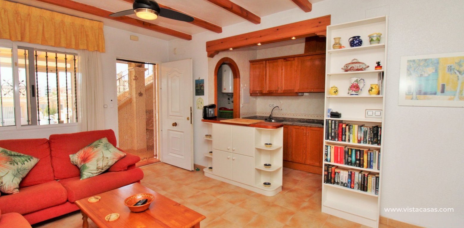 Villamartin 2 bed bungalow monte golf roof terrace pool for sale lounge 4