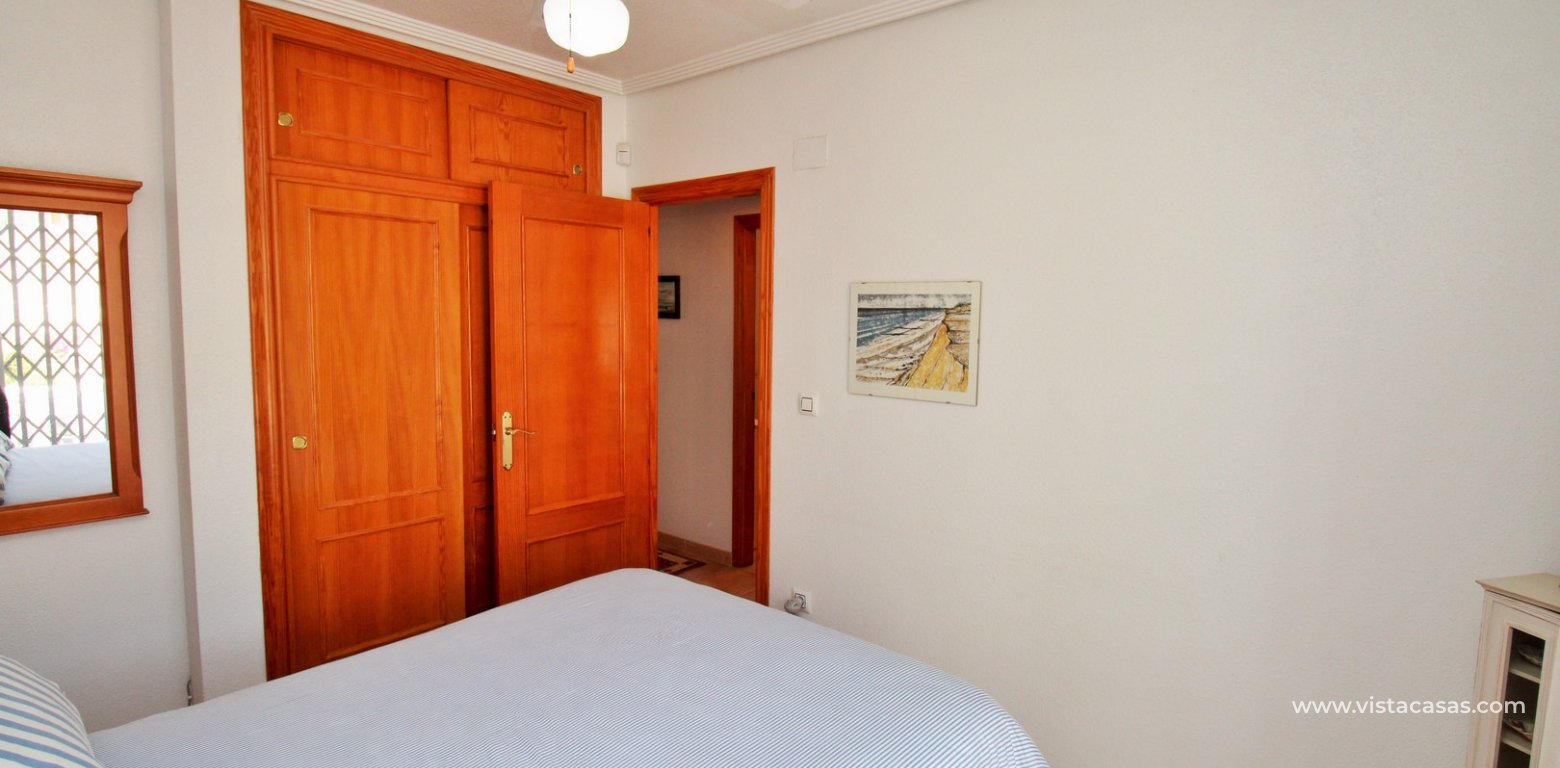 Villamartin 2 bed bungalow monte golf roof terrace pool for sale master bedroom fitted wardrobes