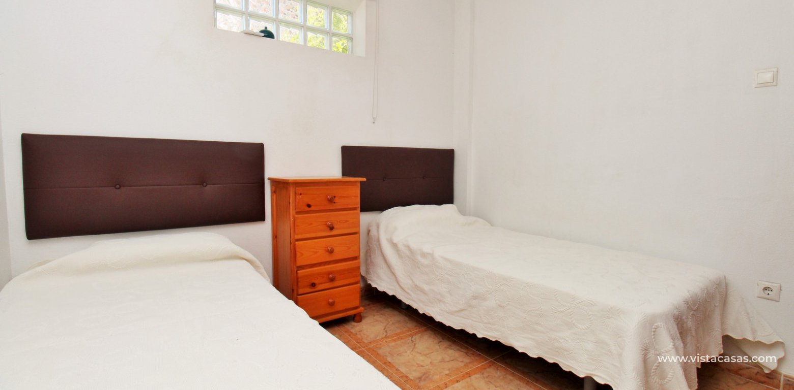 Villamartin apartment with private pool for sale twin bedroom