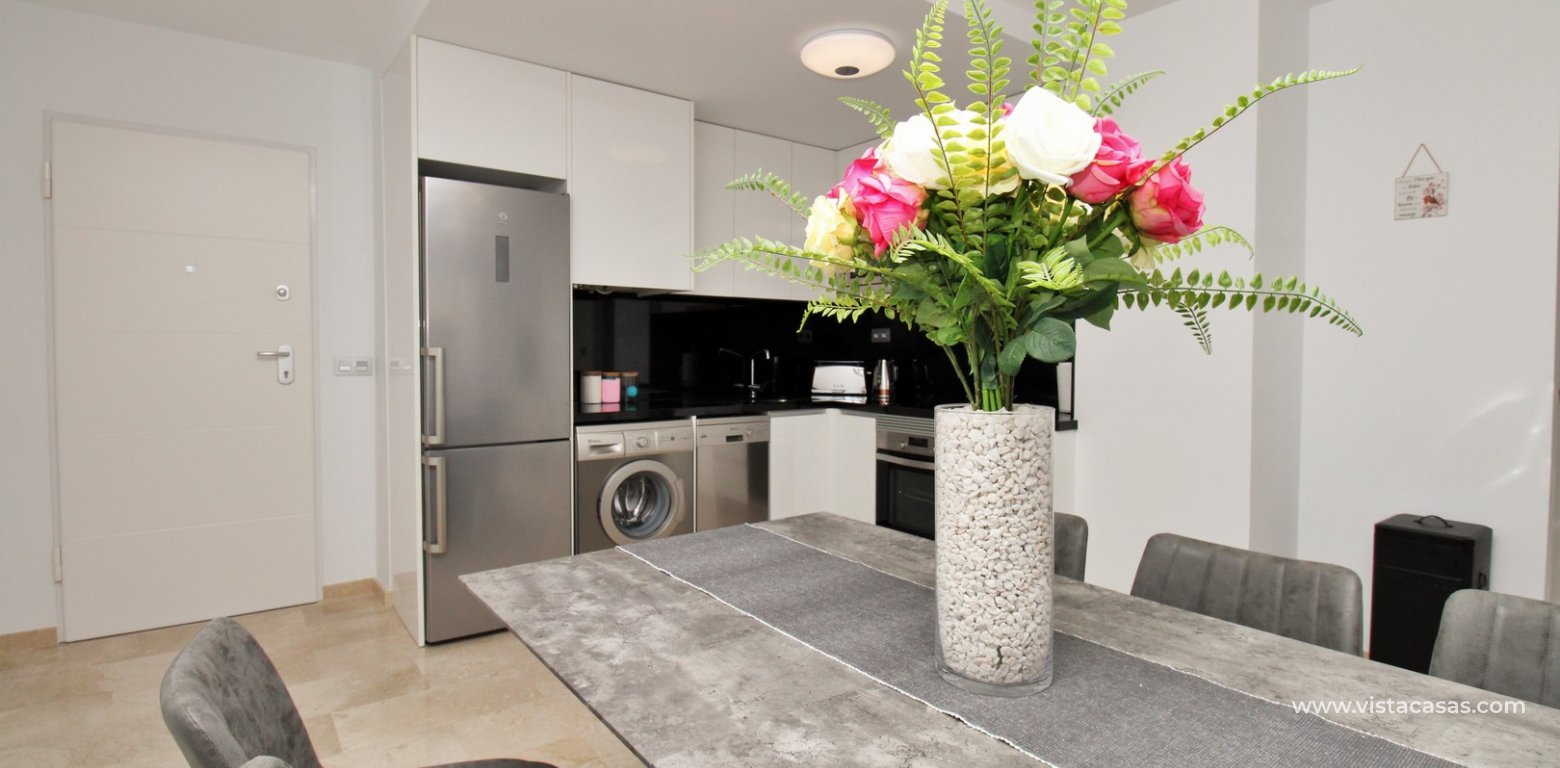 2 Bedroom Apartment with Pool View for sale Sungolf Beach Villamartin dining area