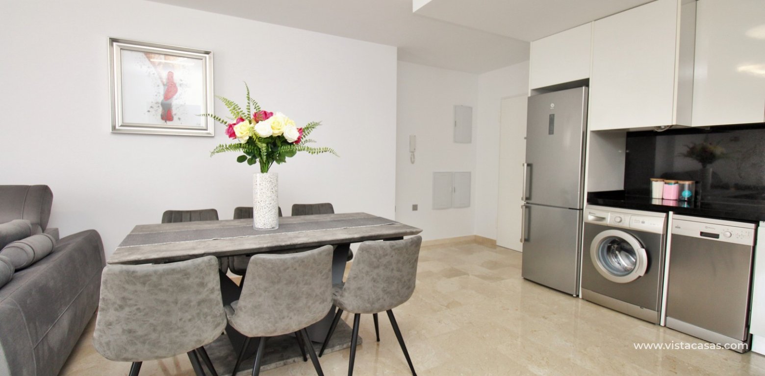 2 Bedroom Apartment with Pool View for sale Sungolf Beach Villamartin dining area 2
