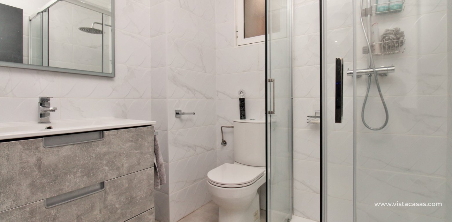 Renovated Quad Villa With Pool Villamartin Pau 26 downstairs bathroom