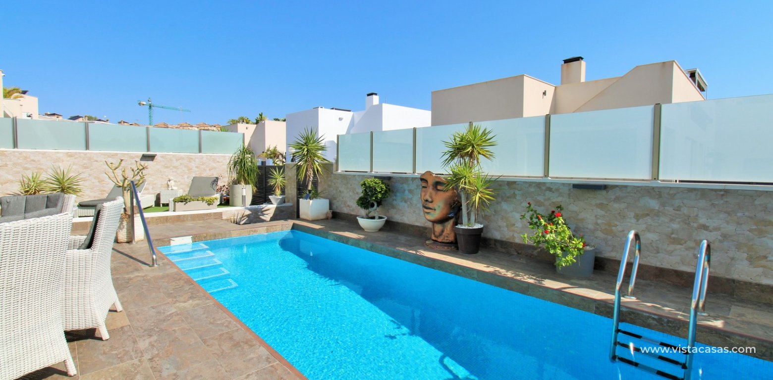 Modern 4-Bed Villa with Pool & Solarium in Villamartin swimming pool