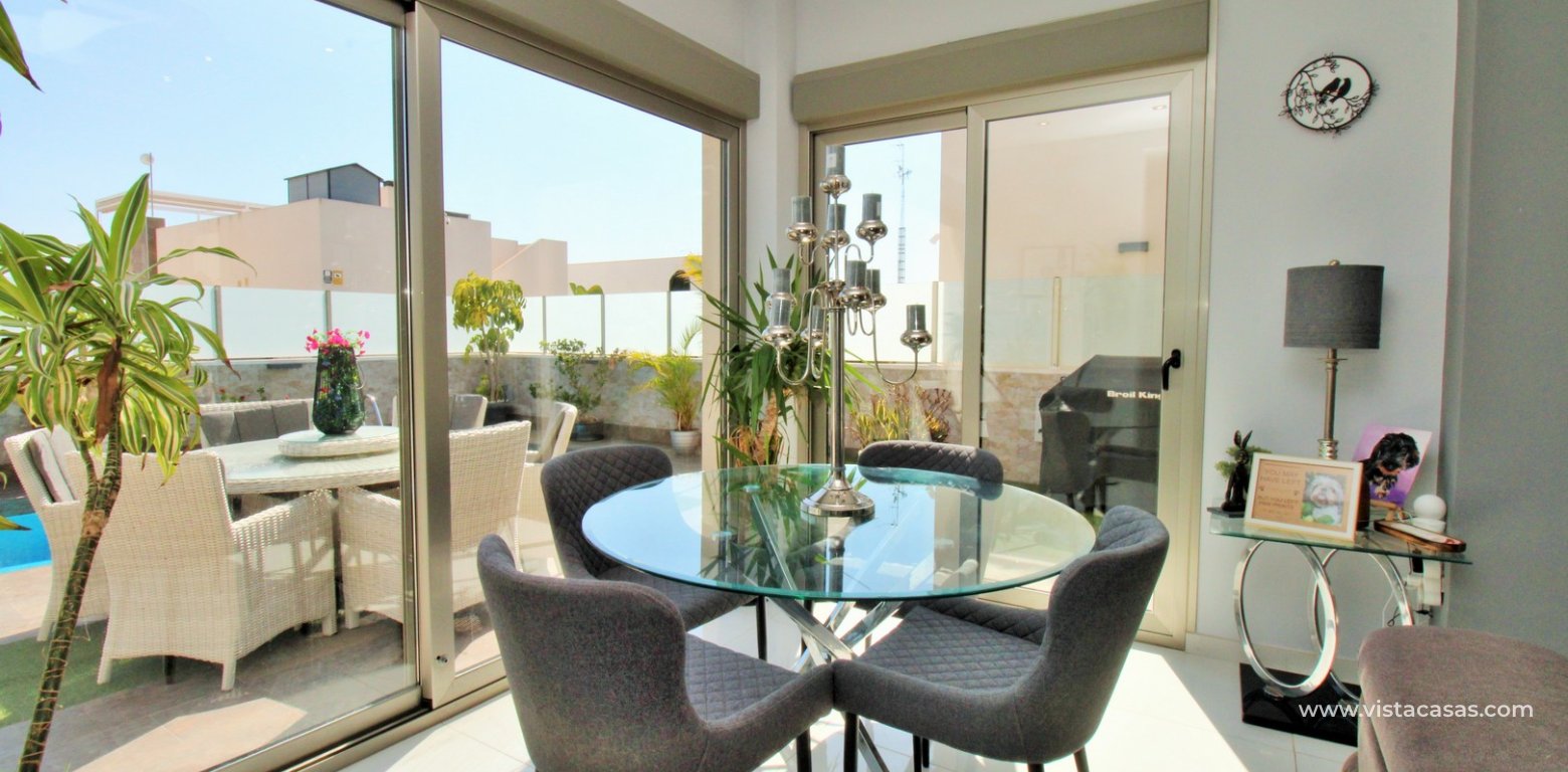 Modern 4-Bed Villa with Pool & Solarium in Villamartin dining area