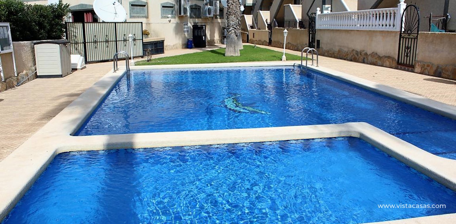 Villa for sale in Las Violetas Villamartin communal pool