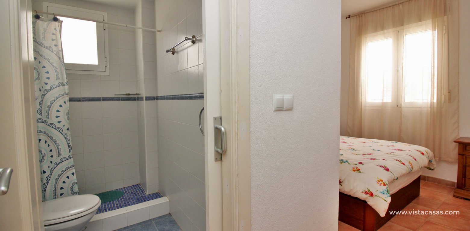 Top floor apartment for sale in Panorama Golf Villamartin master bedroom ensuite