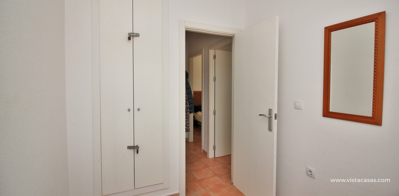 Top floor apartment for sale in Panorama Golf Villamartin single bedroom fitted wardrobes