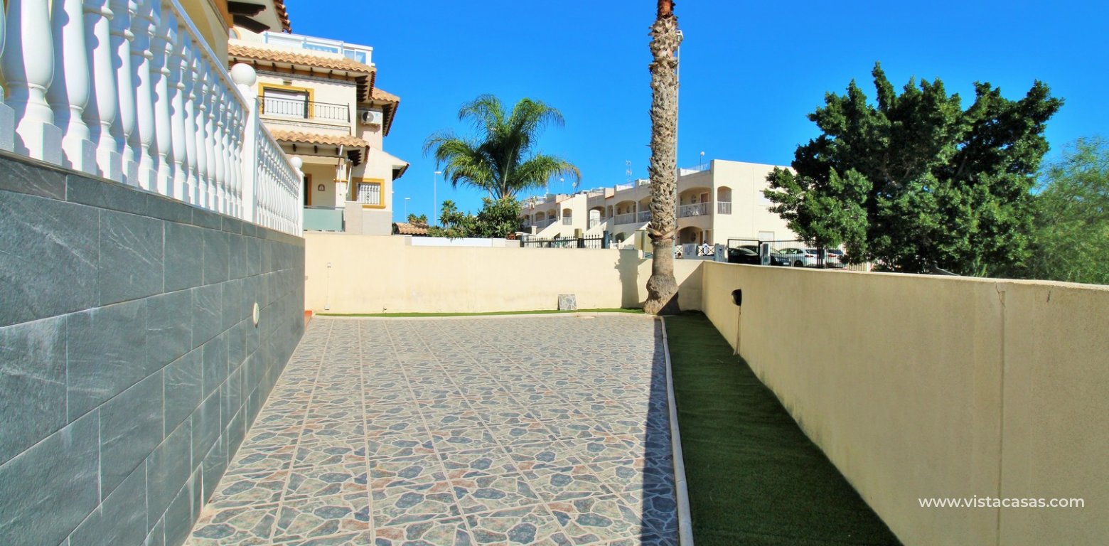 4-Bed Villa with Sea Views & Basement For Sale in Playa Flamenca garden terrace