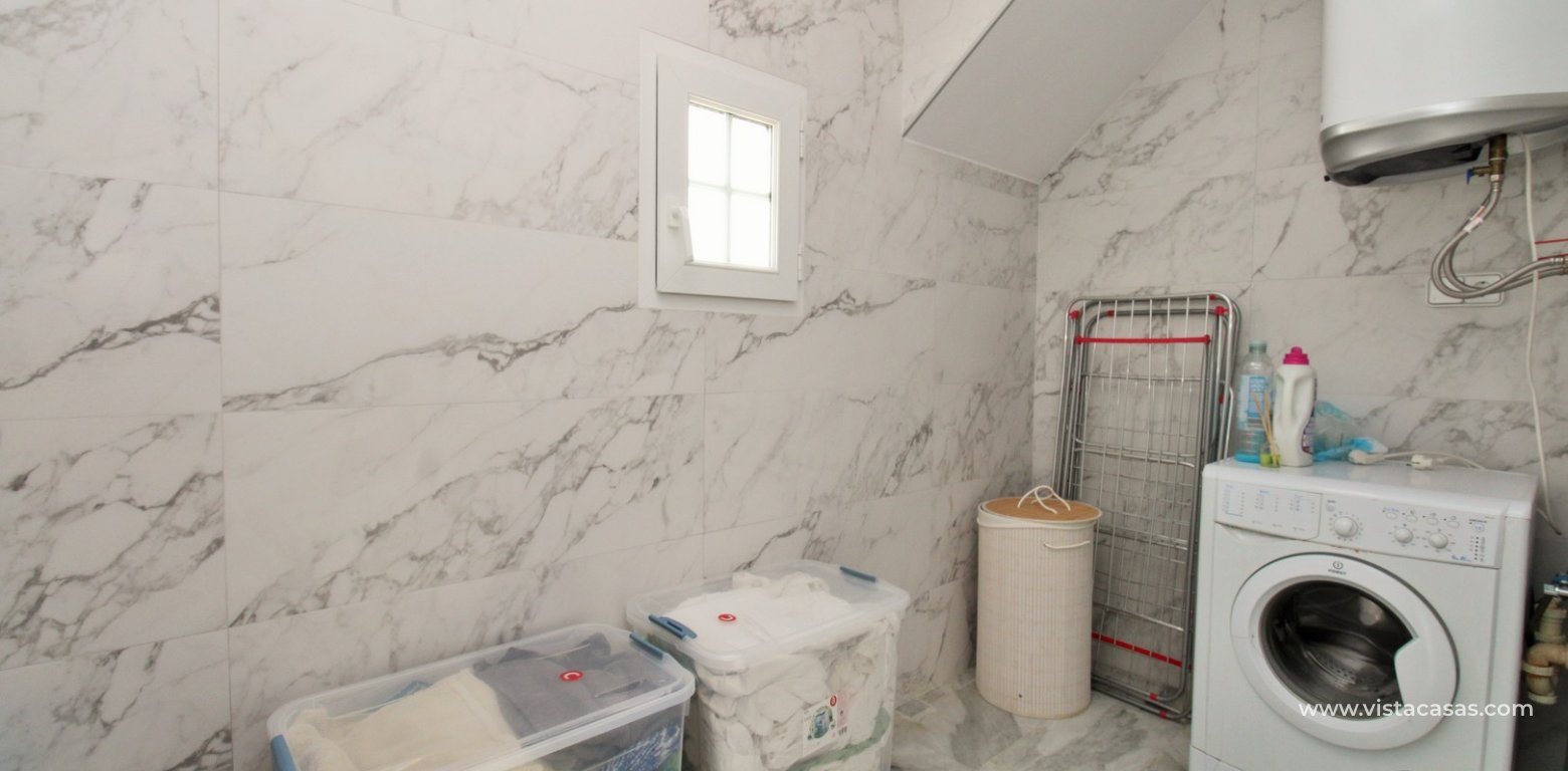 Frontline 3 Bed Villa for Sale in Las Ramblas Golf utility room