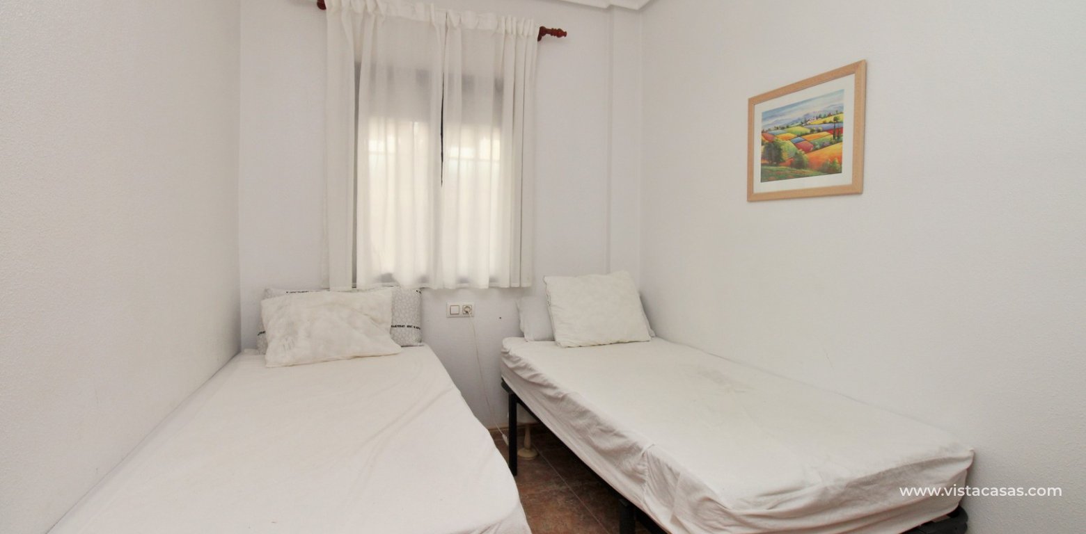 Beachside 2 Bed Apartment in Playa Marina 2 Cabo Roig twin bedroom