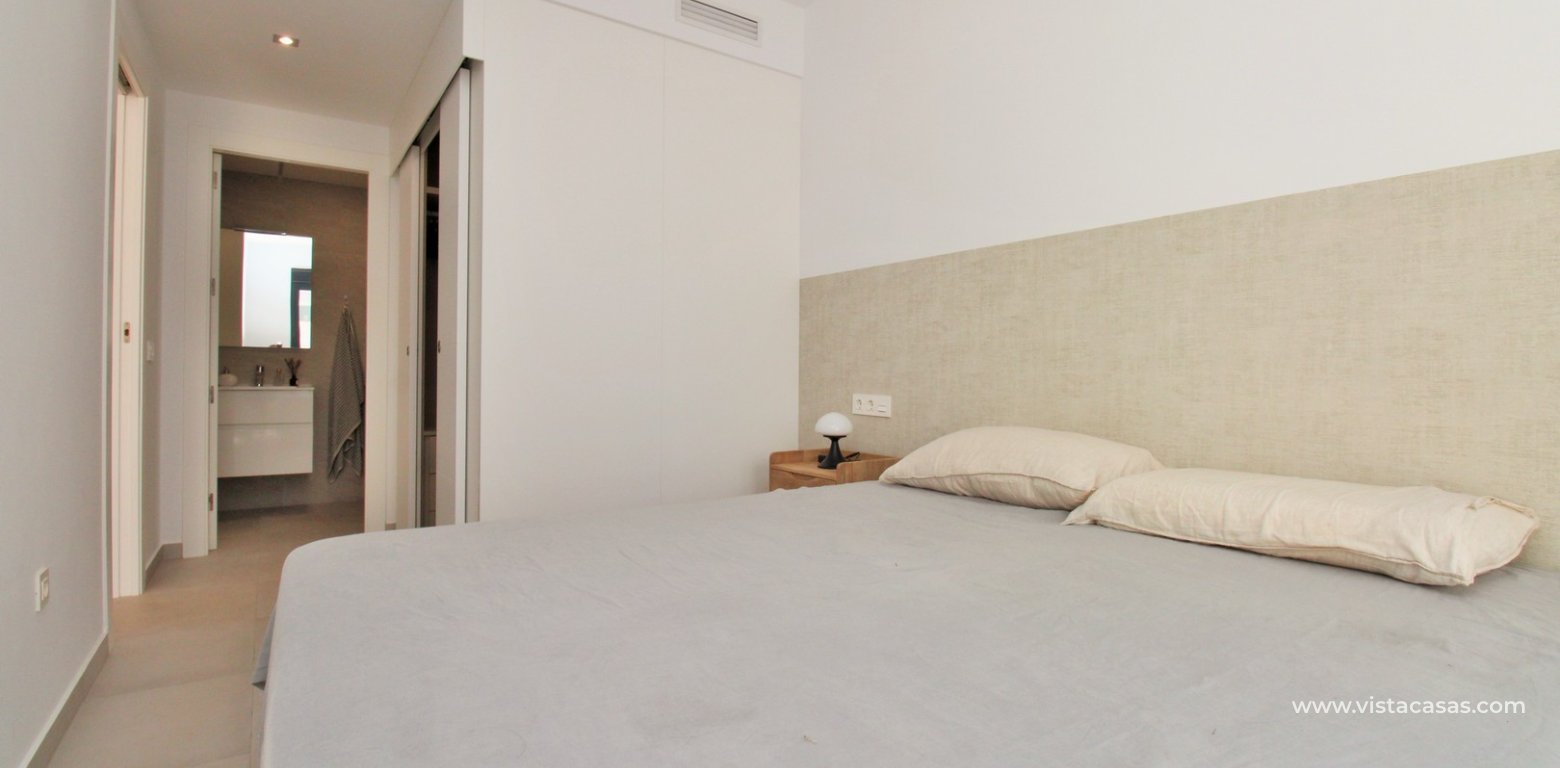 Modern Townhouse with Heated Pool For Sale in Pilar de la Horadada master bedroom fitted wardrobes