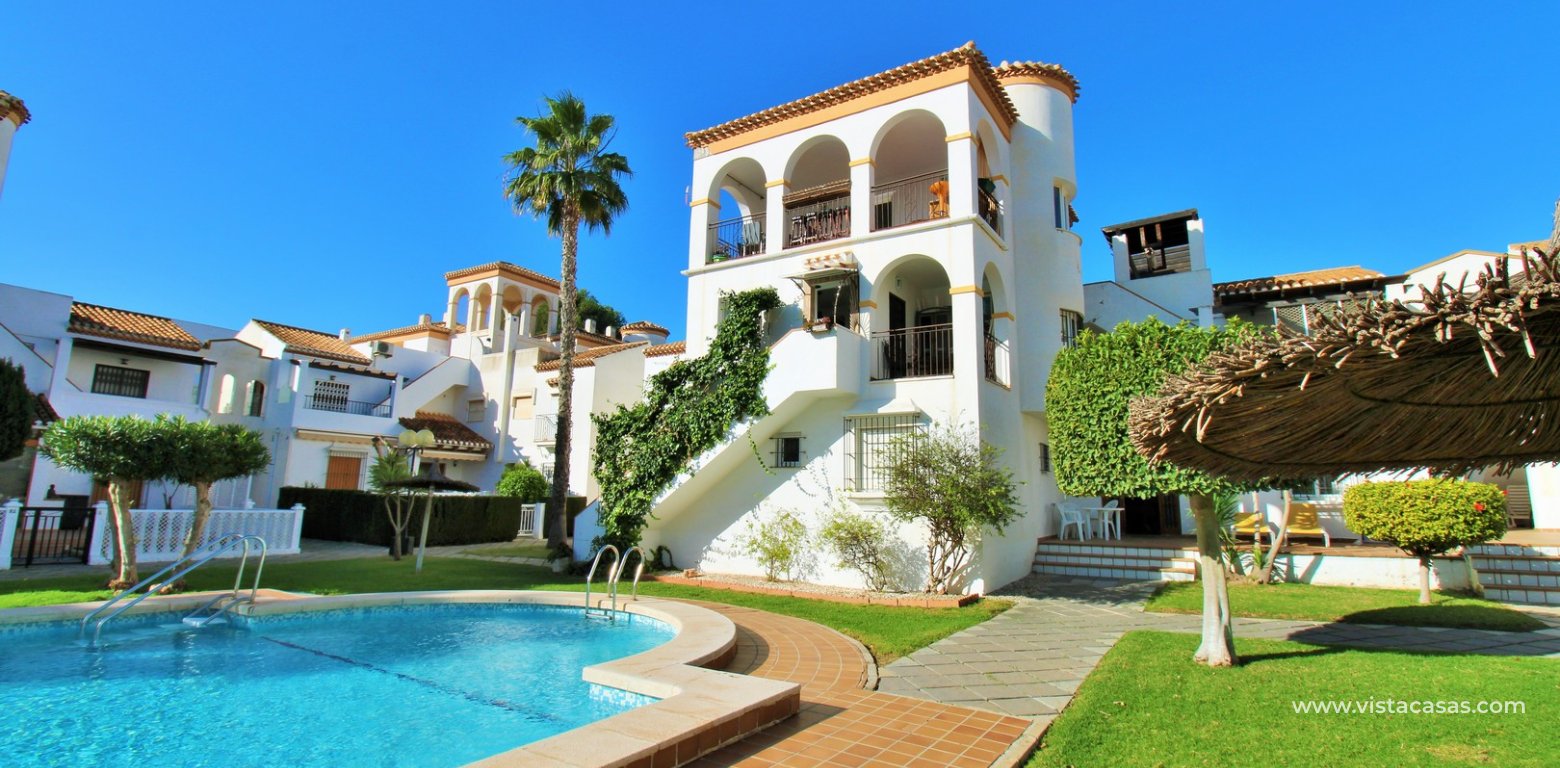 Duplex Penthouse for Sale in Playa Flamenca exterior pool gardens