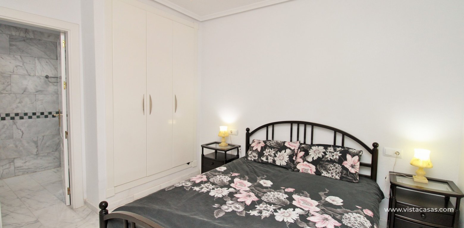 2 Bed Apartment with Lift & Pool For Sale in Pau 8 Villamartin master bedroom fitted wardrobes