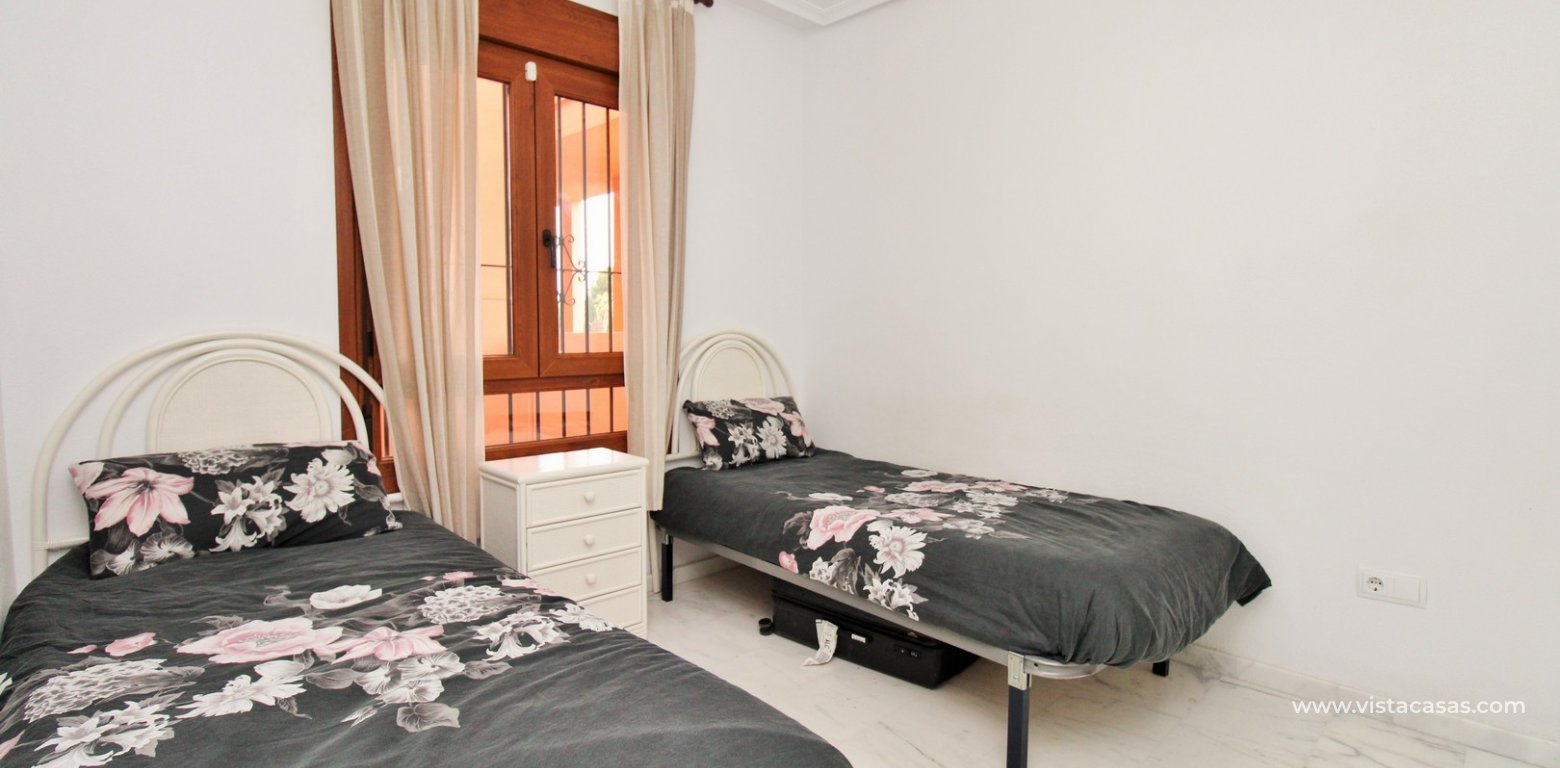 2 Bed Apartment with Lift & Pool For Sale in Pau 8 Villamartin twin bedroom