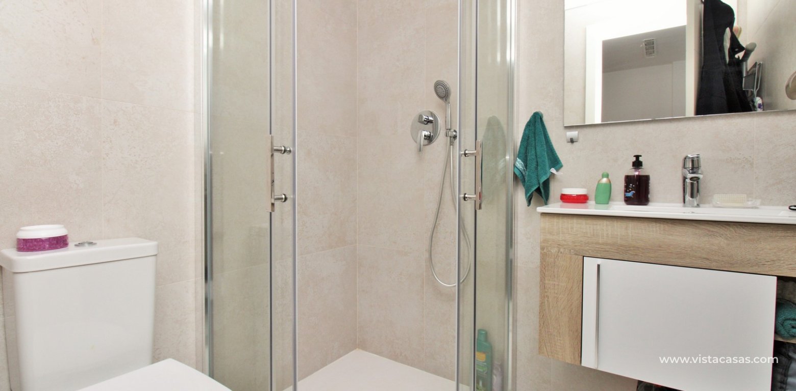 Modern 2 Bed Townhouse with Private Pool in Villamartin bathroom downstairs