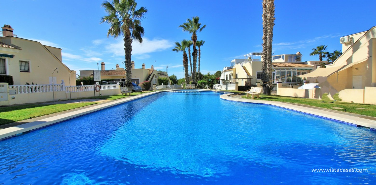 3 Bedroom Corner Townhouse For Sale in Jumilla Playa Flamenca swimming pool