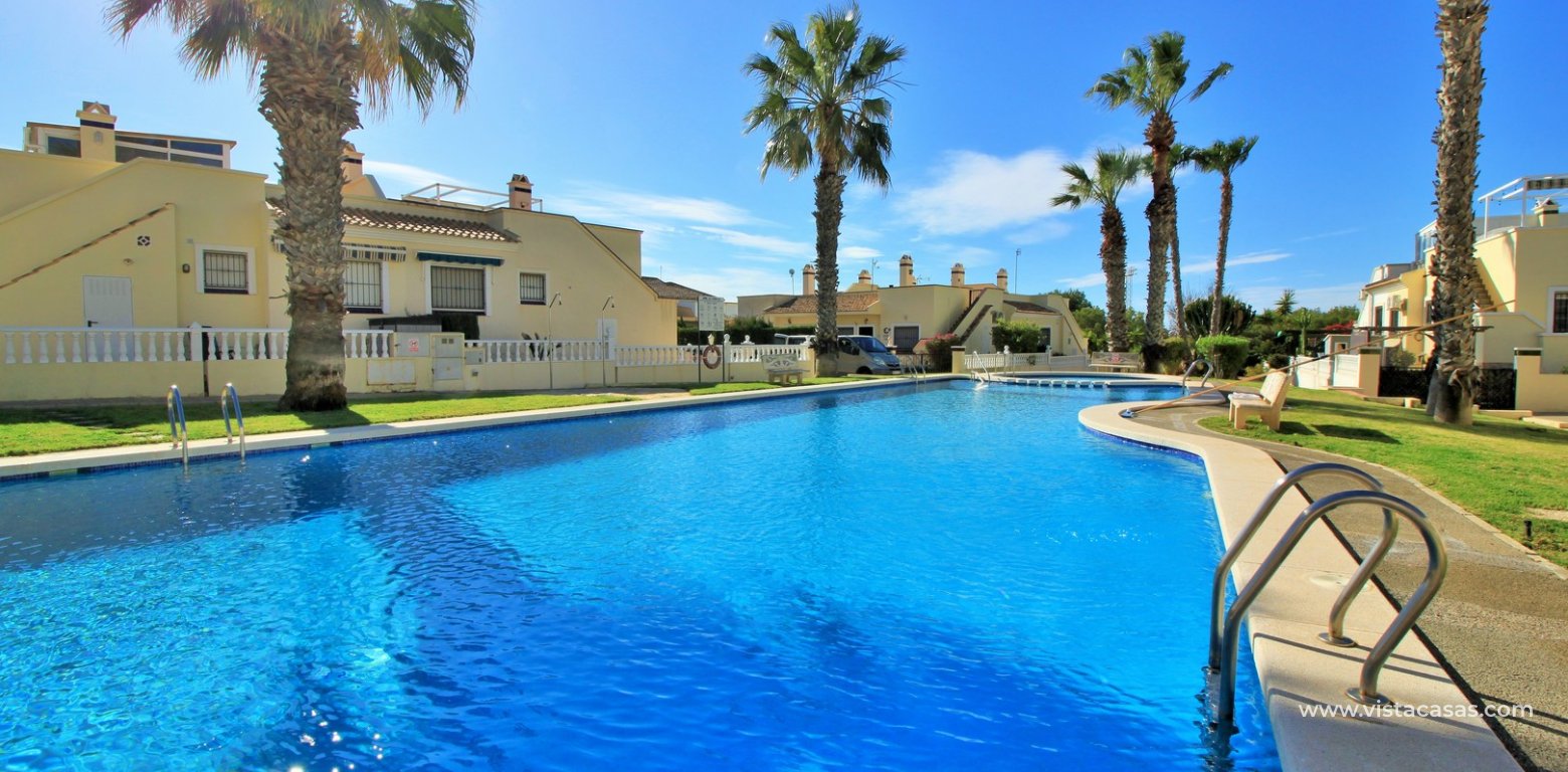 3 Bedroom Corner Townhouse For Sale in Jumilla Playa Flamenca communal pool