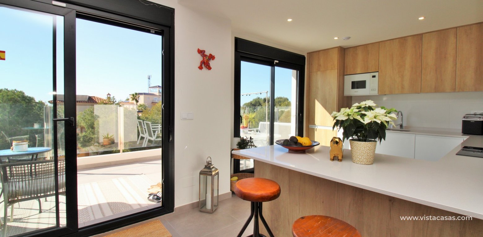 Penthouse with Solarium & Sea Views in Villamartin Villacosta Club kitchen balcony