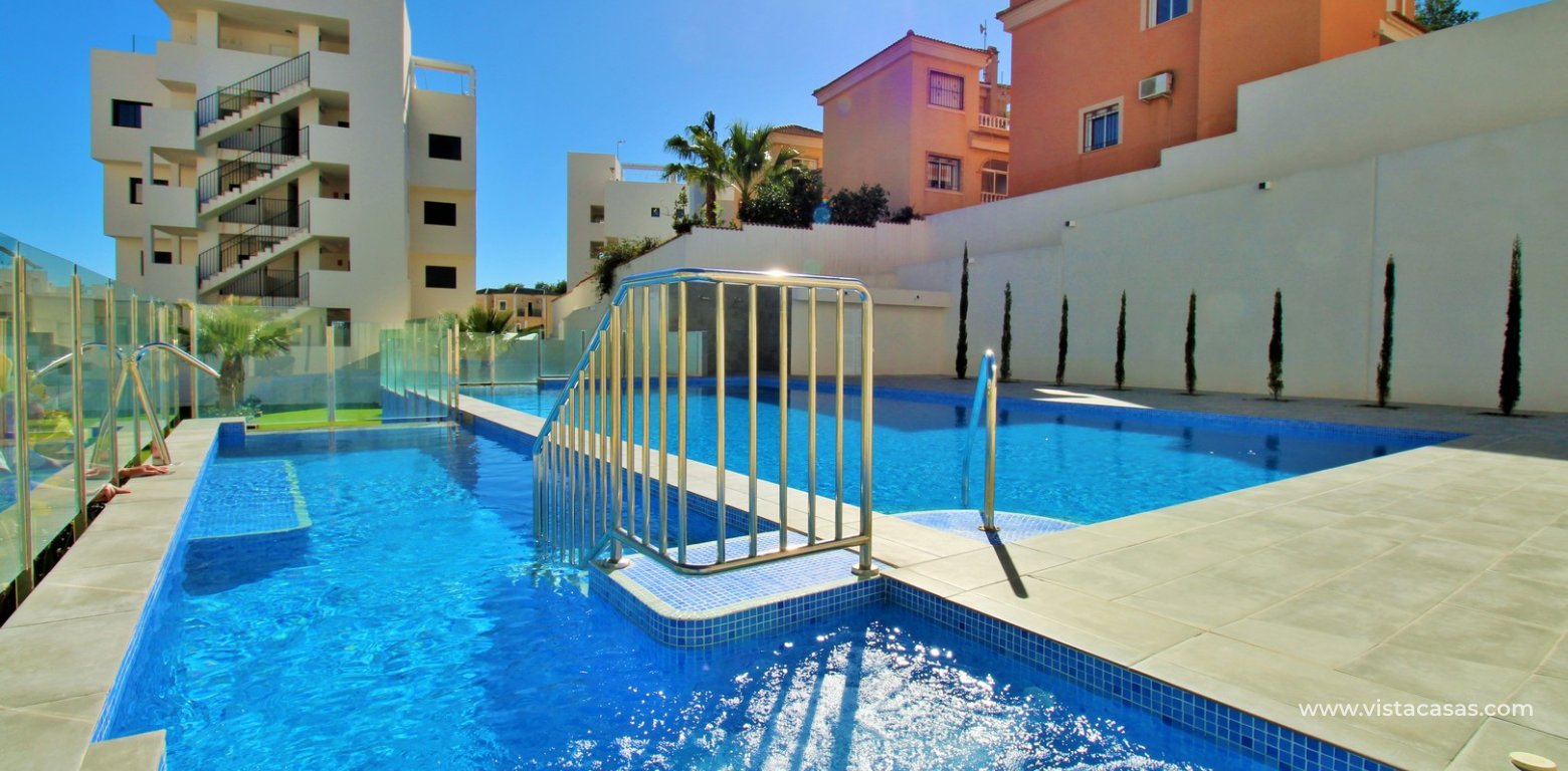 Penthouse with Solarium & Sea Views in Villamartin Villacosta Club communal pool